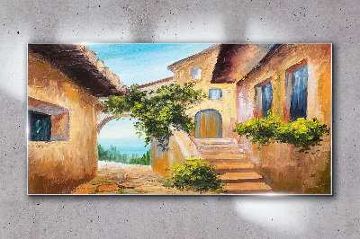 The charming streets of a seaside village Wall art on glass