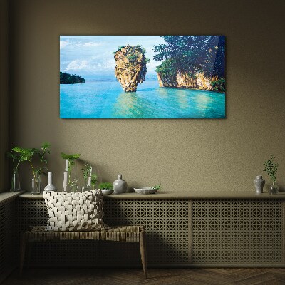 A quiet bay with a high rock Wall art on glass