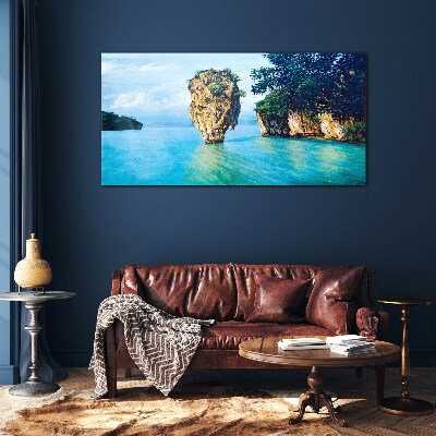 A quiet bay with a high rock Wall art on glass