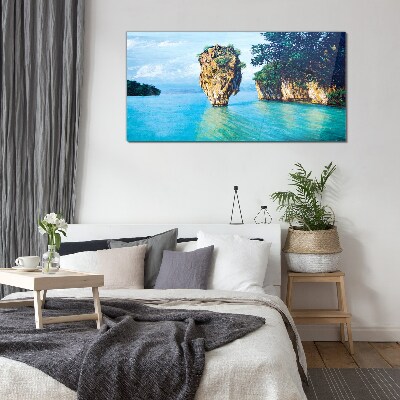 A quiet bay with a high rock Wall art on glass