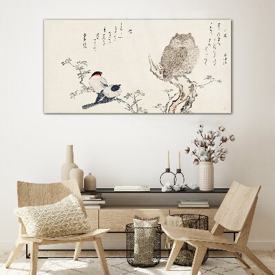 Birds and an owl on a branch Glass art print