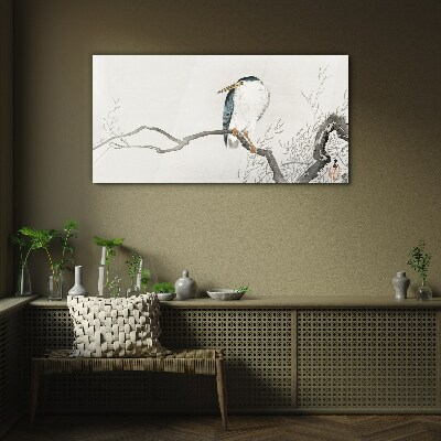 A bird on a branch in a delicate landscape Wall art on glass