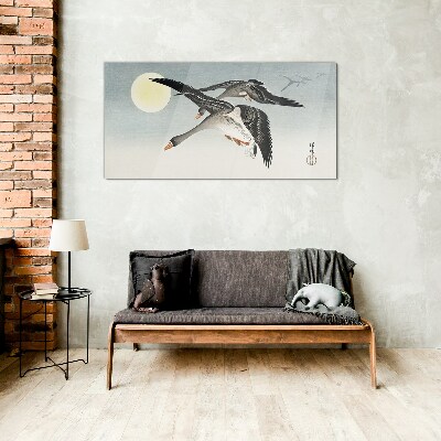 Geese in flight under the full moon Wall art on glass