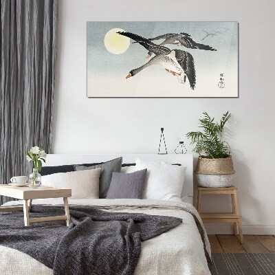 Geese in flight under the full moon Wall art on glass