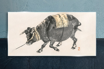 Horned cow on the move Wall art on glass