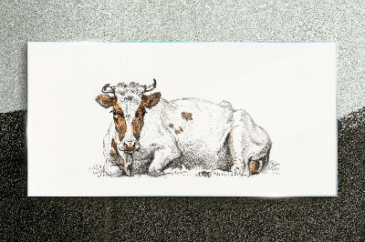 A calm cow in the meadow Glass art print