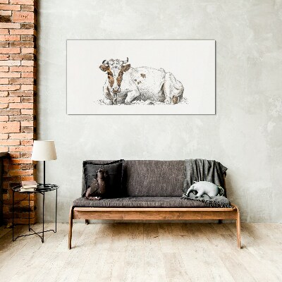 A calm cow in the meadow Glass art print