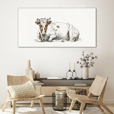 A calm cow in the meadow Glass art print
