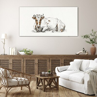 A calm cow in the meadow Glass art print