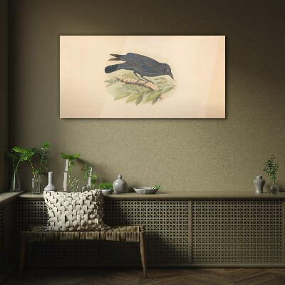 Black bird on a branch Glass art print