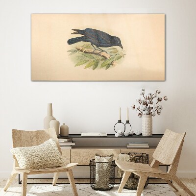 Black bird on a branch Glass art print
