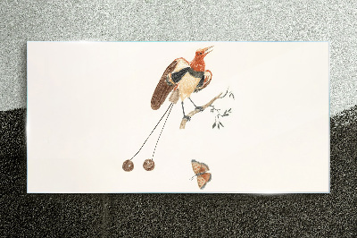 A bird on a branch with fruit Wall art on glass
