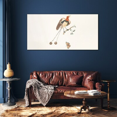 A bird on a branch with fruit Wall art on glass
