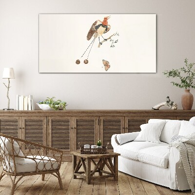 A bird on a branch with fruit Wall art on glass