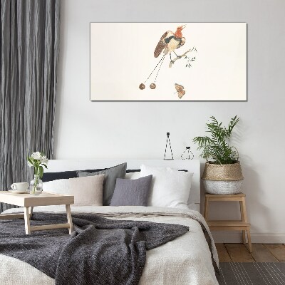 A bird on a branch with fruit Wall art on glass