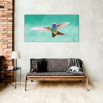 Hummingbird in blue background Wall art on glass
