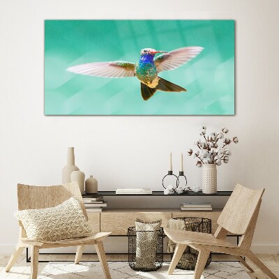 Hummingbird in blue background Wall art on glass