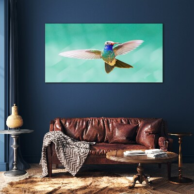 Hummingbird in blue background Wall art on glass