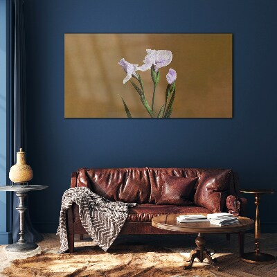 Iris flowers on a brown background Glass art print