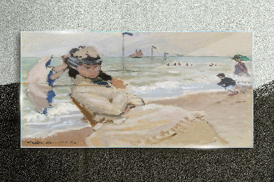 Woman on the beach with an umbrella Wall art on glass
