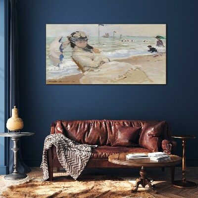 Woman on the beach with an umbrella Wall art on glass
