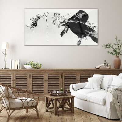 Black bird against the background of nature Glass art print