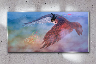 Flight of a bird of prey in the clouds Glass art print