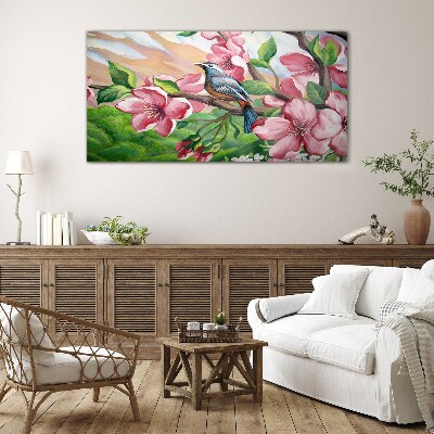 A bird against a background of spring flowers Wall art on glass