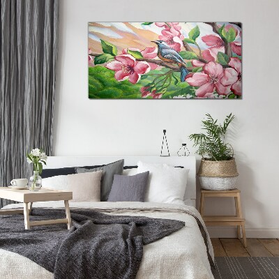 A bird against a background of spring flowers Wall art on glass