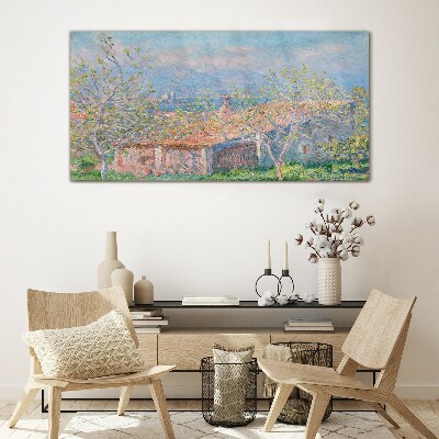 A peaceful landscape with a house and trees Glass art print
