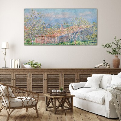 A peaceful landscape with a house and trees Glass art print