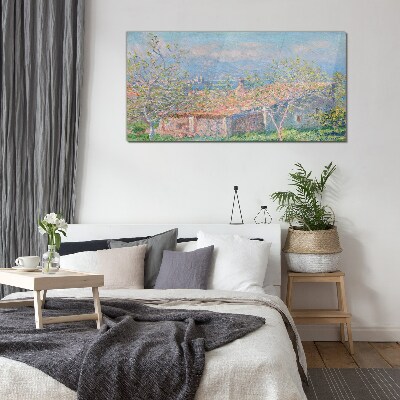 A peaceful landscape with a house and trees Glass art print