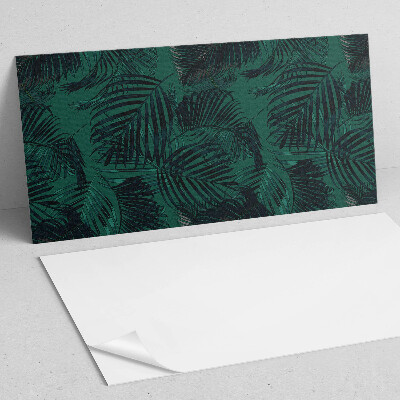 Square tv wall panel Palm leaves on the background