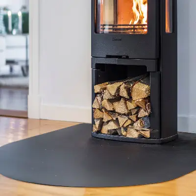 Semi-oval black steel fireplace hearth pad