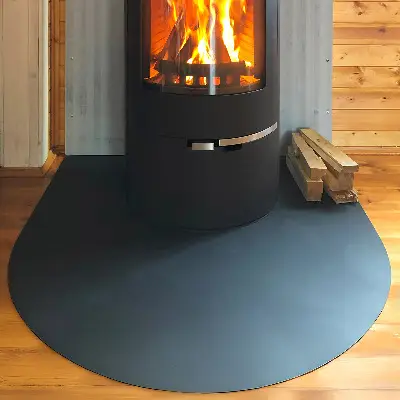Semi-oval black steel fireplace hearth pad