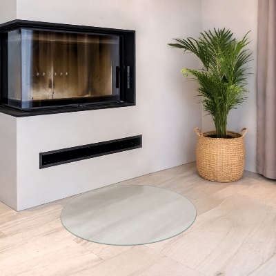 Circular translucent glass fireplace base