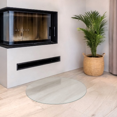 Circular translucent glass fireplace base
