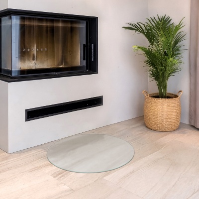 Circular translucent glass fireplace base
