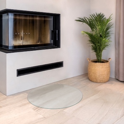 Circular translucent glass fireplace base