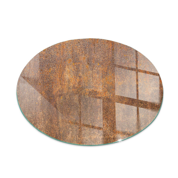 Glass hearth for stove round Rust texture on metal