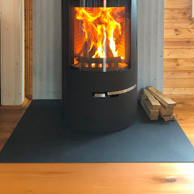 Hearth plate made of rectangular black steel sheet