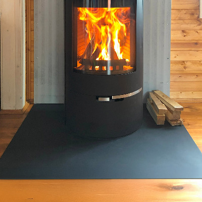 Hearth plate made of rectangular black steel sheet