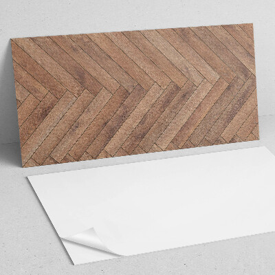 Rectangular decorative wall panel Boards arranged in a herringbone pattern
