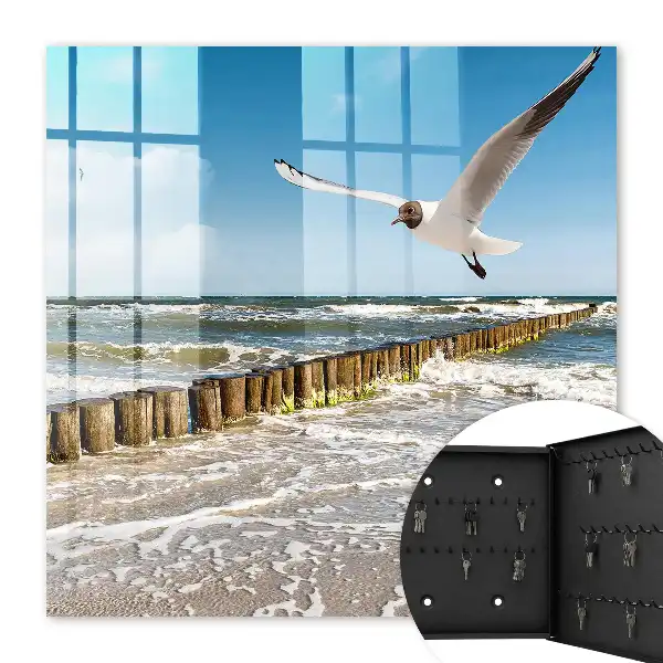 Key cabinet Sea space with a seagull on the beach