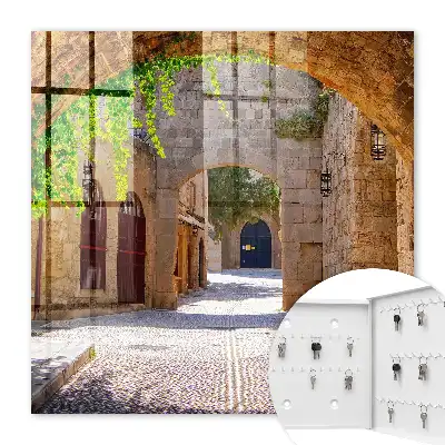 Key box for home A stone street with architecture and greenery
