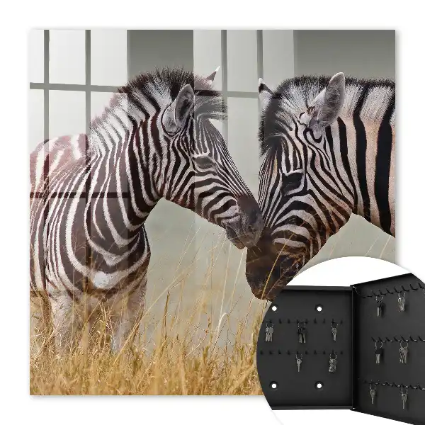 Key box for home Zebras together on a beige background