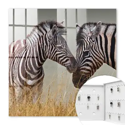 Key box for home Zebras together on a beige background
