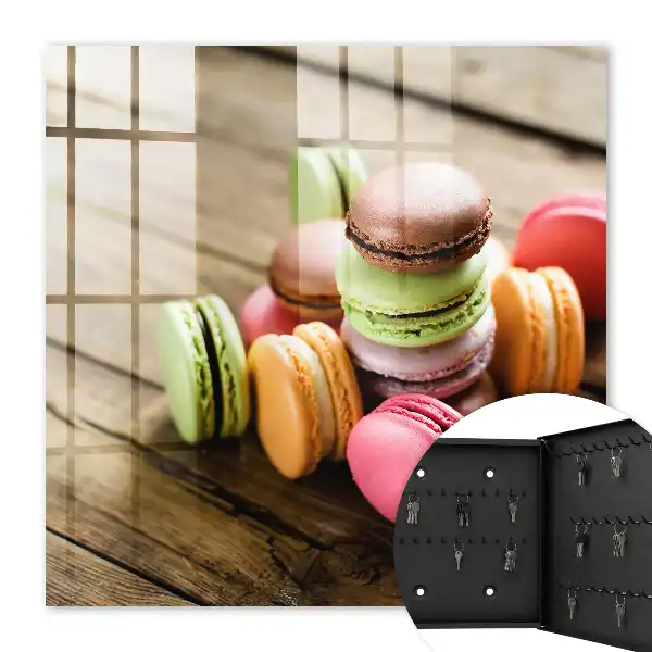 Decorative key box Colorful sweets on a wooden background