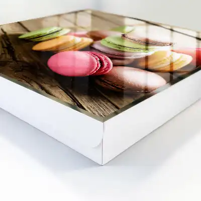 Decorative key box Colorful sweets on a wooden background