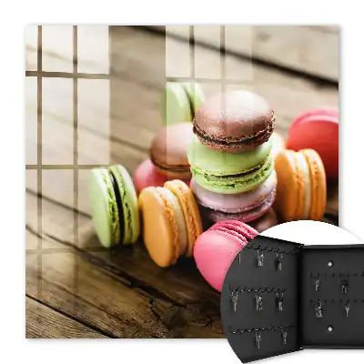 Decorative key box Colorful sweets on a wooden background